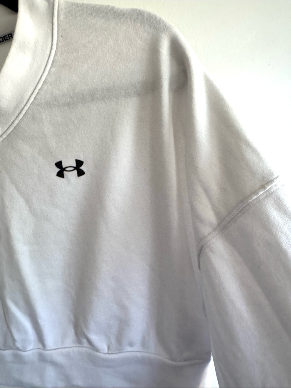 Under Armour Women's White V-Neck Cropped Sweatshirt with Black Logo